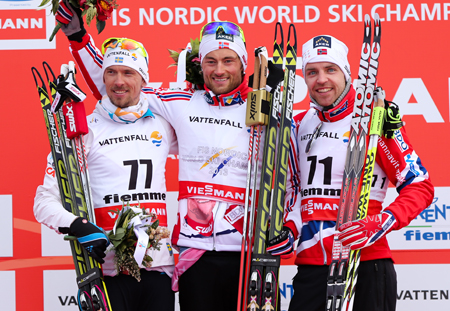 Prispallen på 15 fritt med Olsson, Northug och Gjerdalen. FOTO: Laiho/NordicFocus. Prispallen på 15 fritt med Olsson, Northug och Gjerdalen. FOTO: Laiho/NordicFocus.