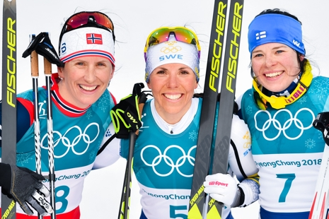 Medaljtrion Björgen, Kalla och Pärmäkoski. FOTO: Petter Arvidsson/Bildbyrån.